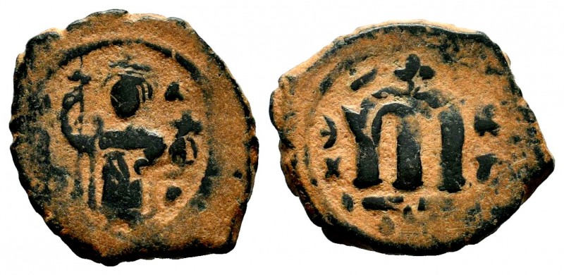 ARAB-BYZANTINE. Early Caliphate (636-660). Ae Fals. 
Condition: Very Fine

Weigh...