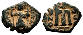 ARAB-BYZANTINE. Early Caliphate (636-660). Ae Fals. 
Condition: Very Fine

Weight: 4,80 gr
Diameter: 19,60 mm