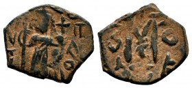 ARAB-BYZANTINE. Early Caliphate (636-660). Ae Fals. 
Condition: Very Fine

Weight: 3,97 gr
Diameter: 18,55 mm