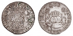MONARQUÍA ESPAÑOLA
CARLOS III
2 Reales. AR. Méjico M. 1769. Tipo columnario. 6,62 g. Cal.1334. Puntos de verdín, si no MBC-. Escasa