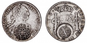 MONARQUÍA ESPAÑOLA
CARLOS IV
8 Reales. AR. Potosí PJ. (18.). Resello de Minas Gerais (Brasil) para su circulación como 960 reis. 26,89 g. Gomes 115,...