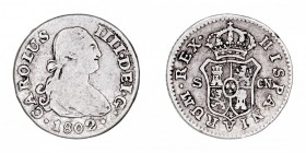 MONARQUÍA ESPAÑOLA
CARLOS IV
1/2 Real. AR. Sevilla CN. 1792. 1,42 g. Cal.1356. MBC-