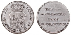 MONARQUÍA ESPAÑOLA
CARLOS IV
AR-27. Medalla Proclamación en Cádiz, 1789. 6,91 g. H.18. Bonita pátina oscura. Muy escasa. MBC/MBC+
