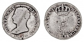 MONARQUÍA ESPAÑOLA
JOSÉ I
4 Reales. Calamina. Madrid AI. 1811. Falsa de época. 5,71 g. BA.No cataloga. Rayas, si no BC. Rara