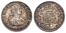 Ferdinand VII (1808-1833). 1/2 real. 1809. México. TH. (Cal 2008-1336). Ag. 1,68 g. Imaginary bust. Lovely tone. Scarce in this grade. XF. Est...90,00...