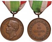 Vittorio Emanuele III (1900-1946) Medaglia Al Merito - AE (g 18,16– Ø 30mm) Con nastrino
BB+