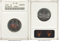 People's Republic Proof 2 Leva 1963 PR68 ANACS, KM65. A stunning gem proof issue with vibrant hues of lagoon blue, violet, crimson, and gold. 

HID098...