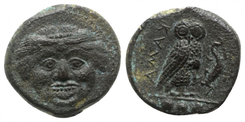 Sicily, Kamarina, c. 420-410 BC. Æ Tetras (14mm, 2.36g, 1h). Gorgoneion. R/ Owl ...