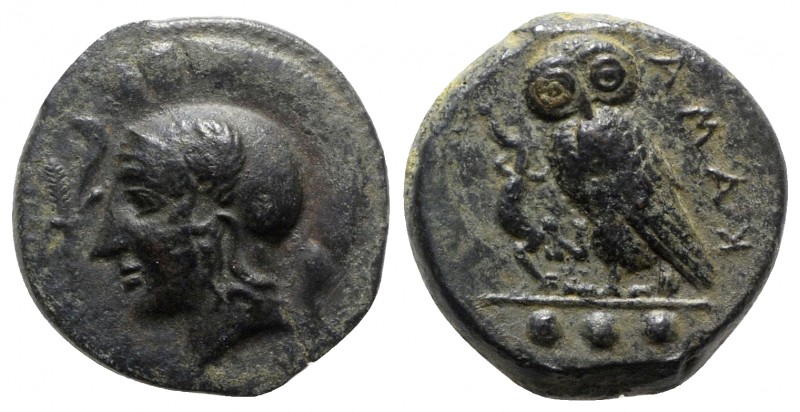 Sicily, Kamarina, c. 410-405 BC. Æ Tetras (14.5mm, 3.42g, 1h). Head of Athena l....
