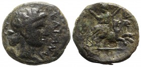 Sicily, Katane, c. 2nd century BC. Æ (20mm, 7.86g, 12h). Head of Dionysos r., wearing ivy wreath. R/ Dionysos, holding kantharos and thyrsos, reclinin...