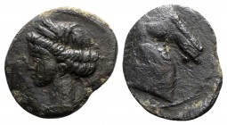 Carthage, c. 264-241 BC. Æ Quarter Shekel (13mm, 1.45g, 6h). Head of Tanit l., wearing wreath of grain ears and single-pendant earring. R/ Head of hor...