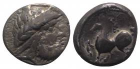 Celtic, Eastern Europe, 2nd century BC. AR Tetradrachm (22mm, 9.86g, 1h). Imitating Philip II of Macedon. Laureate head of Zeus r. R/ Rider on horseba...