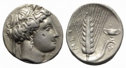 Southern Lucania, Metapontion, c. 340-330 BC. AR Stater (20mm, 7.72g, 1h). Wreathed head of Demeter r. R/ Barley ear with leaf to r.; krater above lea...