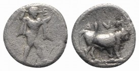 Southern Lucania, Sybaris, c. 446-440 BC. AR Triobol (10mm, 1.11g, 6h). Poseidon advancing r., wielding trident. R/ Bull standing r. HNItaly 1748; SNG...