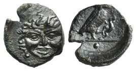Sicily, Kamarina, c. 420-405 BC. Æ Onkia (12mm, 1.24g, 6h). Facing gorgoneion. R/ Owl standing r., head facing, grasping lizard in talons. CNS III, 15...