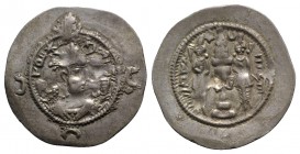 Sasanian Kings of Persia. Khusrau I (531-579). AR Drachm (30mm, 4.11g, 9h). AYLA mint, year 37 (567/8). Crowned bust r. R/ Two attendants beside fire ...