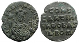 Constantine VII and Romanus I (913-959). Æ 40 Nummi (25mm, 5.73g, 5h). Constantinople. Facing bust, wearing crown and loros, holding labarum and globu...
