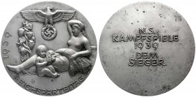 Medaillen, Drittes Reich
Große Zinkmedaille 1939. Siegermedaille der NS-Kampfspiele. Avers Motiv des Tagungsabzeichens zum Nürnberger Reichsparteitag...