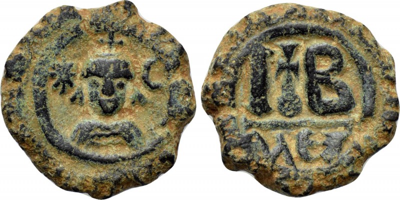 HERACLIUS (610-641). 12 Nummi. Alexandria. 

Obv: Draped facing bust (of Khosr...