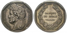 Jeton Octagonal, 1836, AG 32 mm poinçon Main par Caque
Avers: LOUIS PHILIPPE I ROI DES FRANÇAIS
Revers: BANQUE DE LILLE 29 JUIN 1836
PCGS AU58