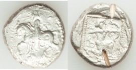 CILICIA. Tarsus. Ca. late 5th century BC. AR stater (23mm, 10.46 gm, 6h). VF, with test cuts. Satrap on horseback riding left, reins in left hand; eag...