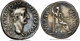 Tiberius (AD 14-37). AR denarius (18mm, 4h). NGC VF, edge punches. Lugdunum, ca. AD 18-35. TI CAESAR DIVI-AVG F AVGVSTVS, laureate head of Tiberius ri...
