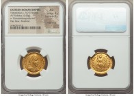 Theodosius I, Eastern Roman Empire (AD 379-395). AV solidus (21mm, 4.44 gm, 6h). NGC AU 4/5 - 2/5, edge filing, flan flaw, and brushed. Constantinople...