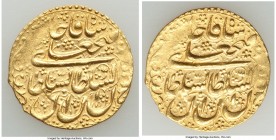Qajar. Fath Ali Shah gold Toman AH 1232 (1816/7) AU (Mount Removed), Isfahan mint, KM753.4, Farahbakhsh-Unl. 23mm. 4.59gm. 

HID09801242017