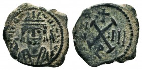 Maurice Tiberius (582-602), Ae Half Follis,

Condition: Very Fine

Weight: 3.2 gr
Diameter: 19 mm