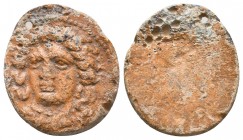 GREEK LEAD SEALS. Uncertain (4th-2nd centuries BC).
Obv: Head of Apollo
Rev: Blank.

Condition: Very Fine

Weight: 7.4 gr
Diameter: 23 mm