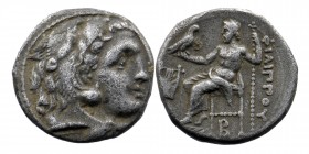 Kingdom of Macedon, Philip III Arrhidaios AR Drachm. 
In the types of Alexander III. Kolophon, circa 323-319 BC. 
Obv: Head of Herakles right, wearing...