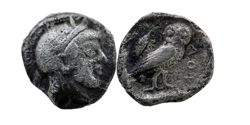 Attica, Athens. 449-404 B.C. AR obol 
Helmeted head of Athena right
Rev: AΘE, ow...