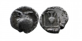 Asia Minor, Uncertain city Circa 450 BC, Obol
Obv: Helmet right
Rev: Amphora within an incuse square. 
Ref G&M 176