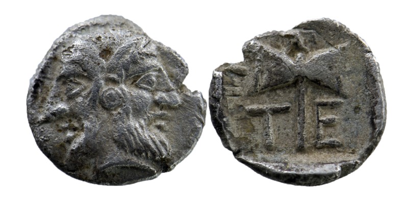 Troas, Tenedos AR Obol. Circa 5th Century BC.
Janiform head, female on left, mal...