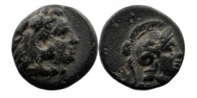 Mysia, Pergamon. Ca. 310-284 B.C. AE 
Head of Herakles right, wearing lion's skin headdress.
Rev: Helmeted head of Athena right. 
SNG Cop 323; SNG BN ...