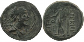 CILICIA. Korykos. Ae (1st century BC).
Obv: Draped bust of Artemis right, bow and quiver over shoulder; monogram below (Λ K)
Apollo standing left, hol...