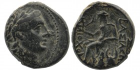 SELEUKID KINGS OF SYRIA. Antiochos II Theos, 261-246 BC. AE 
 Laureate head of Apollo to right.
Rev: Rev. BAΣΙΛΕΩΣ ANTIOXOY Apollo seated left on omph...