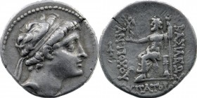 SELEUKID KINGS of SYRIA. Antiochos V. 164-162 BC. AR Drachm
Antioch mint.
Obv: Diademed head right.
Rev: Zeus seated left, holding Nike and sceptre; m...