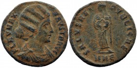 FAUSTA (Augusta, 324-326). Ae. Nikomedia.
Draped bust of Fausta right
Rev: Fausta standing facing head left, holding two children (Constantius II and ...
