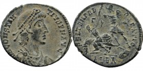 CONSTANTIUS II (337-361). Ae. Alexandria.
Diademed, draped and cuirassed bust right.
Rev: Soldier left, holding shield and spearing fallen horseman to...