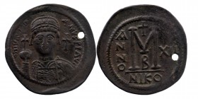 Justinian I AD 527-565. Nikomedia. Follis AE Nikomedia
D N IVSTINI-ANVS PP AVG, cuirassed and helmeted facing bust, holding globus cruciger; cross in ...
