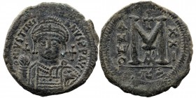Justin II (AD 565-578), AE Follis, Antioch
Helmeted and cuirassed bust facing, holding Victory on globe and shield, 
Rev: large M between ANNO - XXI b...