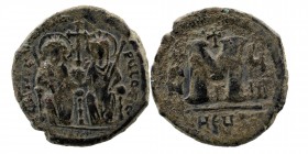 Justin II, with Sophia. 565-578. AE Follis. 
Theoupolis (Antioch) mint, 3rd officina. Dated RY 7 (571/2). 
Justin and Sophia, both nimbate, enthroned ...
