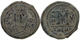 Mauricius Tiberius (582-602 AD). AE Follis Theoupolis (Antiochia)
Obv: Crowned bust of Maurice facing.
Rev. Large M flanked by ANNO XI, cross above.
E...