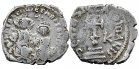 Heraclius, with Heraclius Constantine. 610-641. AR Hexagram
Constantinople mint.
Heraclius and Heraclius Constantine seated facing on double throne, b...