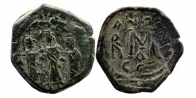 Heraclius, with Martina and Heraclius Constantine, 610-641. Follis AE
Constantinopoli
Obv: Heraclius in center, Heraclius Constantine on the right and...