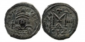 Heraclius. 610-641. AE Follis . Cyzicus mint
Helmeted and cuirassed bust facing, holding cross
Rev: Large M; cross above, A/N/N/O III across field; A/...