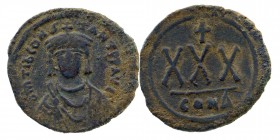 Tiberius II Constantine. 578-582. AE three-quarter follis
Constantinople mint. d m TIb CONSTANT P P AVG, crowned, draped and cuirassed bust facing 
Re...