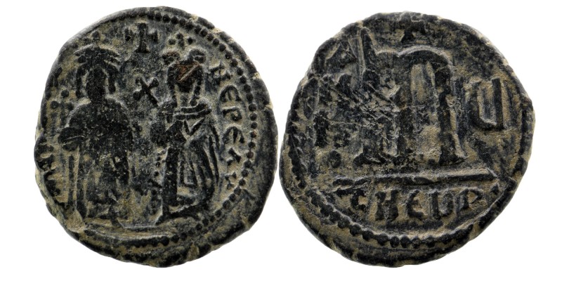 Phocas, 602-610 AE Follis Antioch
Phocas, crowned holding globus cruciger; to ri...