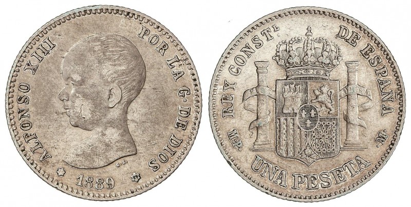 PESETA SYSTEM: ALFONSO XIII
1 Peseta. 1889 (*__-89). M.P.-M. (Rayas y hojita en...